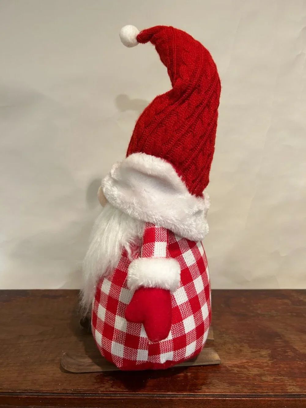 Christmas Holiday Gnome with red knit cap, red plaid torso, wispy white beard